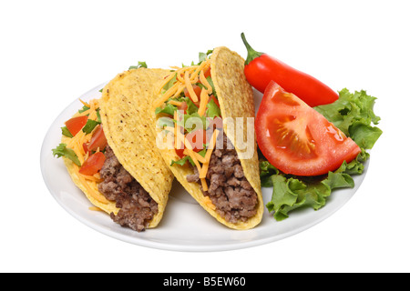 Plate with tacos cutout on white background Stock Photo