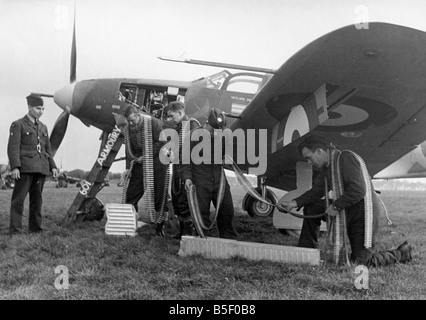 US troops in England during the Second World War RAF 601 Squadron fighter command loading ammunition onto the American Airacobra fighter plane October 1941