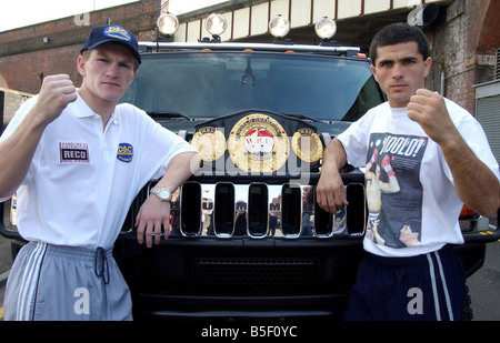 Ricky Hatton and Aldo Rios seen here standing in front of Hummvee car Hummer to promote thir Light Welterweight title fight September 2003 Stock Photo