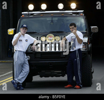 Ricky Hatton and Aldo Rios seen here standing in front of Hummvee car Hummer to promote thir Light Welterweight title fight September 2003 Stock Photo