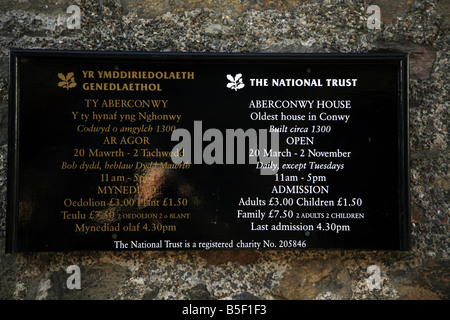 Information sign on the oldest building in the town of Conwy, Aberconwy House, built circa 1300AD, now a National Trust property Stock Photo