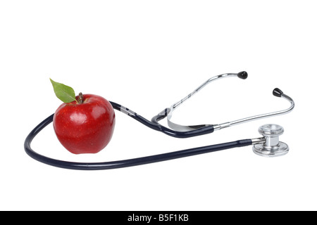 Stethoscope and red apple cutout on white background Stock Photo