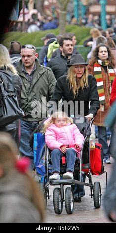 Exclusive Pictures Heather Mills takes daughter Beatrice on a three day break to Disneyland in Paris Heather accompanied by a female friend and a burly boduguard spent 4 000 on the mini break after an arduous two week divorce battle with estranged husband Sir Paul McCartney in ther High Court Stock Photo
