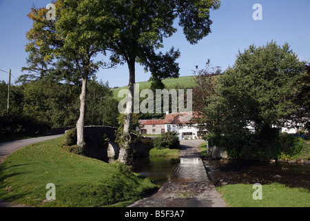 The pretty Exmoor hamlet of  Malmsmead on Badgworthy Water in the Doone Valley near Oare Stock Photo