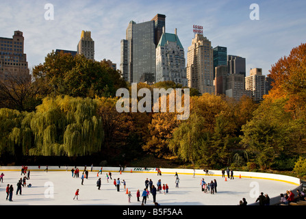 ice skating in Central Park in autumn fall ,new york,new york,america,usa. Stock Photo