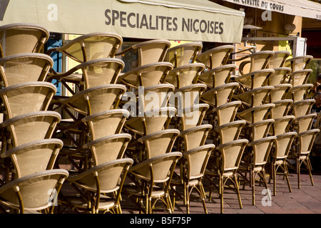 Chairs stacked at cafe in Flower Market Nice France Stock Photo