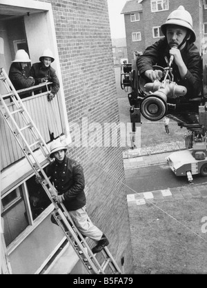 Fire rescue demonstration at Walker Firefighter Chris Foster on turntable ladder shows how people are rescued from flats within Stock Photo