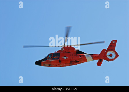 Coast guard helicopter on a rescue mission Stock Photo