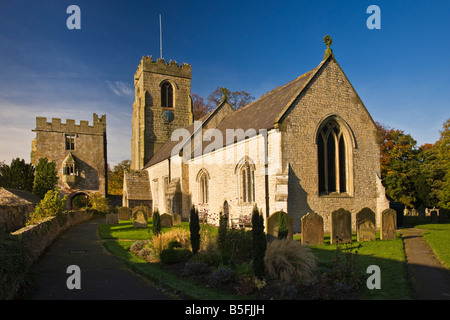 The Marmion Tower and St Nicholas Church West Tanfield North Yorkshire Stock Photo