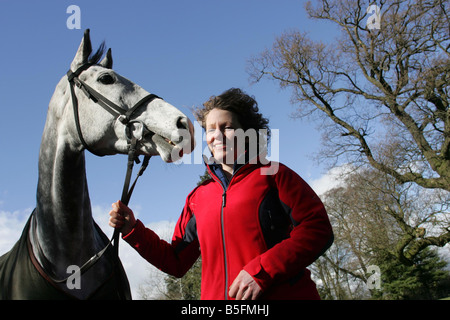 Racehorse Trainer Lucinda Russell with Horse Strong Resolve at their stables near Milnathort in Kinross  Stock Photo