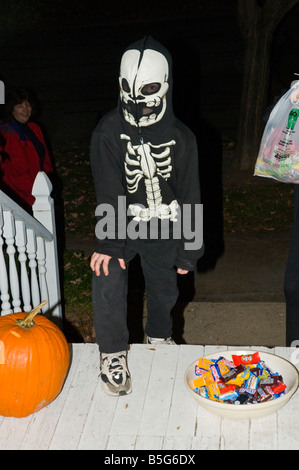 Halloween kid dressed as skeleton Stock Photo