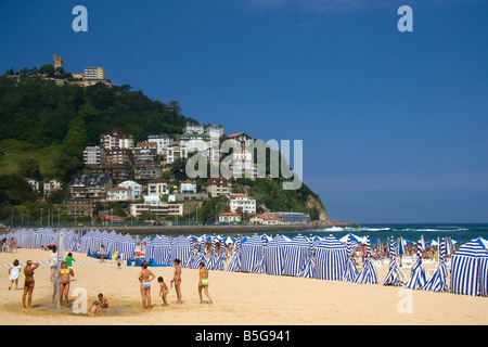 Beach scene at La Concha Bay in the city of Donostia San Sebastian Guipuzcoa Basque Country Northern Spain Stock Photo