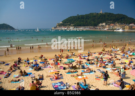 Beach scene at La Concha Bay in the city of Donostia San Sebastian Guipuzcoa Basque Country Northern Spain Stock Photo
