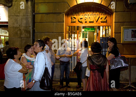 People socialize in front of a tavern in the city of Bilbao Biscay Basque Country northern Spain Stock Photo