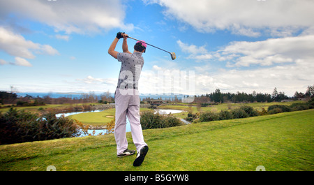 Golfing Cordova Bay Golf course, Victoria BC Stock Photo
