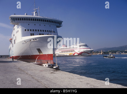 Freight ferry 'Borja' + Cruise Ship 'Ocean Village Two' and historic Porto Pi lighthouse, in the Port of Palma de Mallorca. Stock Photo