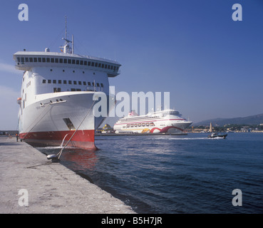 Freight ferry 'Borja' + Cruise Ship 'Ocean Village Two' and historic Porto Pi lighthouse, in the Port of Palma de Mallorca. Stock Photo