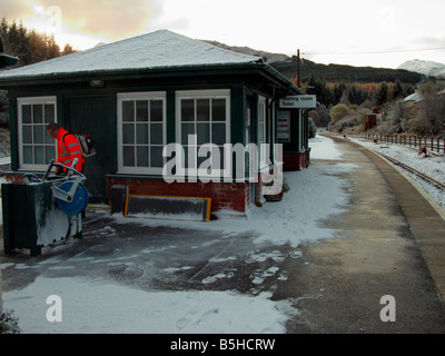 On the rail tracks, early morning snow clearance at Crianlarich Station. Looking South Stock Photo