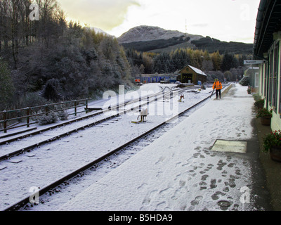On the rail tracks, early morning snow clearance at Crianlarich Station. Looking South Stock Photo