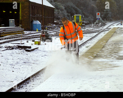 On the rail tracks, early morning snow clearance at Crianlarich Station. Looking South Stock Photo