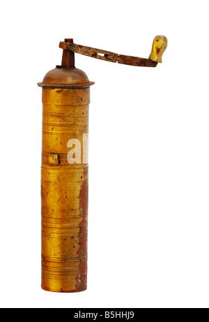 Detail of the antique coffee grinder over white background - isolated Stock Photo
