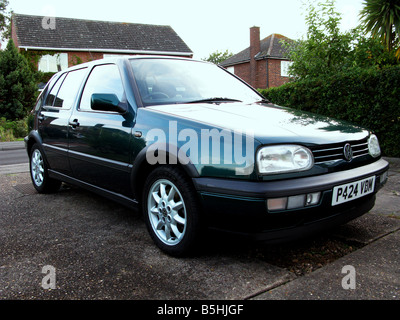 The Mk3 GTi, built to last, pocket rocket, solid motoring, enthusiasts, boy racer, two-bar grille, black wheel arches, bumper extension, hot hatch. Stock Photo