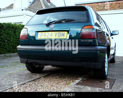 The Mk3 GTi, built to last, pocket rocket, solid motoring, enthusiasts, boy racer, two-bar grille, black wheel arches, bumper extension, hot hatch. Stock Photo