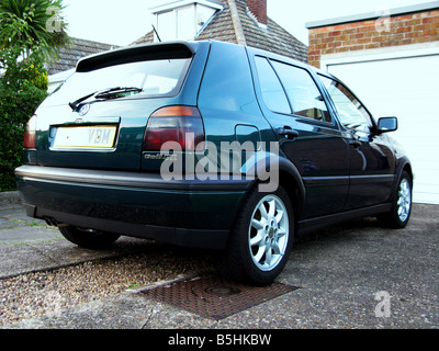 The Mk3 GTi, built to last, pocket rocket, solid motoring, enthusiasts, boy racer, two-bar grille, black wheel arches, bumper extension, hot hatch. Stock Photo