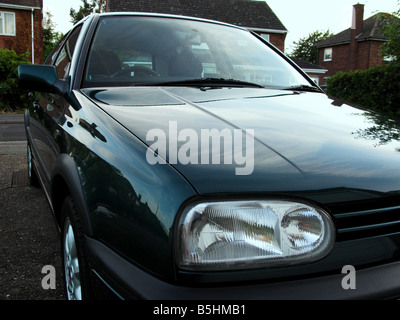 The Mk3 GTi, built to last, pocket rocket, solid motoring, enthusiasts, boy racer, two-bar grille, black wheel arches, bumper extension, hot hatch. Stock Photo