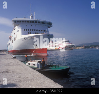 Freight ferry 'Borja' + Cruise Ship 'Ocean Village Two' and historic Porto Pi lighthouse, in the Port of Palma de Mallorca. Stock Photo