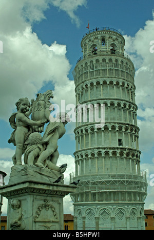 The leaning tower and nearby statue, Pisa , Italy Stock Photo