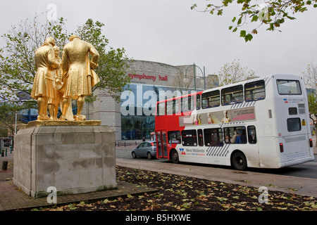 The gilded bronze statue of Matthew Boulton, James Watt and William Murdoch by William Bloye stands on a plinth of Portland stone, outside the old Register Office on Broad Street in Birmingham, England. Stock Photo