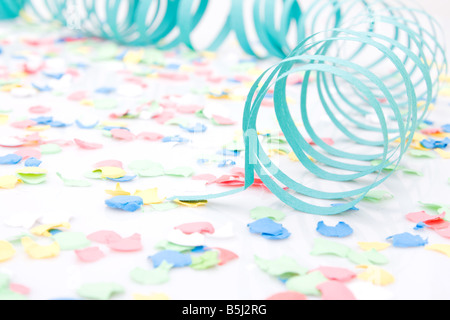 Several colourful party paper ribbons and confetti Stock Photo