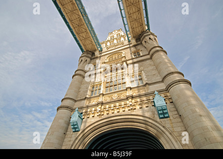 LONDON, United Kingdom — Tower Bridge, an iconic symbol of London, spans the River Thames near the Tower of London. The combined bascule and suspension bridge, completed in 1894, is a marvel of Victorian engineering and a significant historical landmark, drawing tourists from around the world. Stock Photo