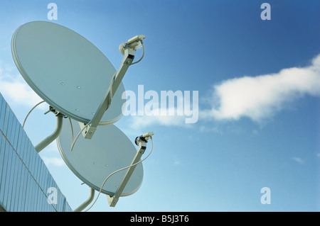 Communication antenna under blue sky Stock Photo