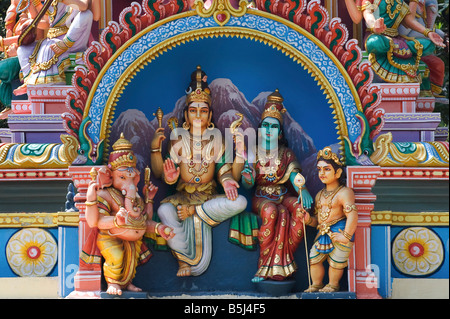 Hindu deities, sculpted painted statues, on a hindu temple in Banglore, India Stock Photo