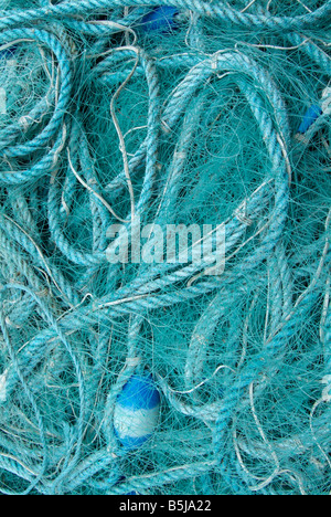 fishing nets harbour quay wall side multicolour Stock Photo