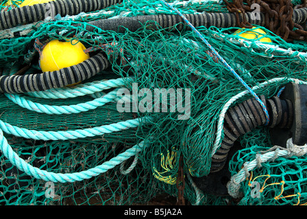 fishing nets harbour quay wall side multicolour Stock Photo