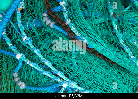 fishing nets harbour quay wall side multicolour Stock Photo