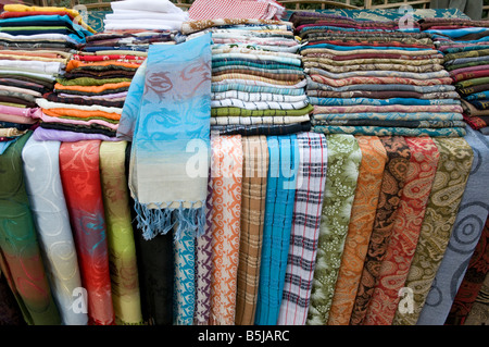 Silk scarves for sale in Aswan Souk a colorful bazaar locally known as Sharia as-Souq, Aswan Egypt Stock Photo