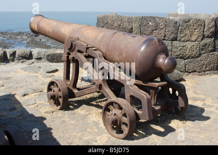 Rusty cannon on castle Stock Photo