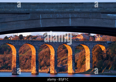 View of the road and Royal Border Railway Bridge across the River Tweed to the town of Berwick-upon-Tweed Stock Photo