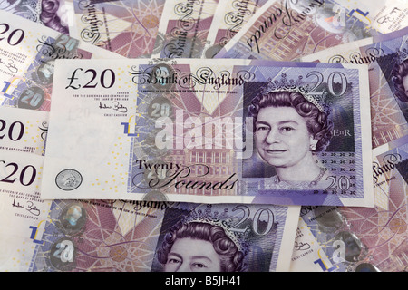 pile of 20 pounds sterling bank notes cash Stock Photo