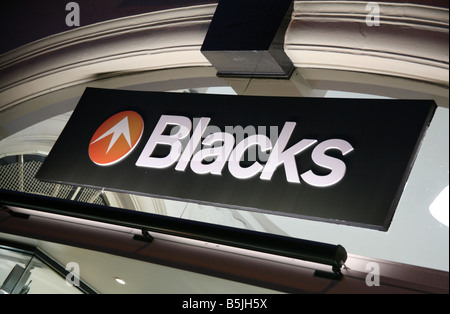 Sign on branch of Blacks outdoor wear store London Stock Photo