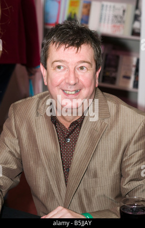 Stuart Maconie at the Cheltenham Literature Festival Gloucestershire England Stuart John Maconie is an English radio DJ Stock Photo