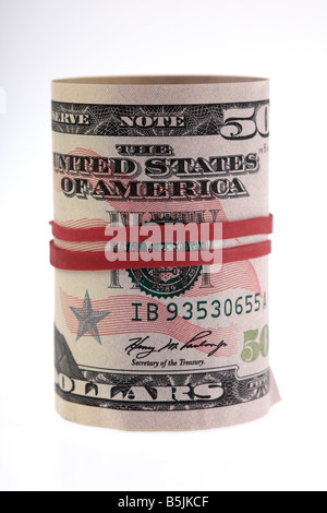 wad of 50 usa dollar bank notes cash tied up in a roll with elastic band Stock Photo