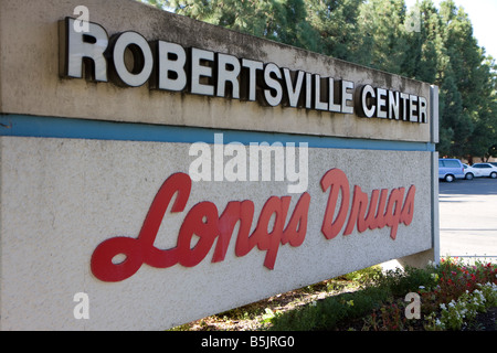 Sign depicting 'Longs Drugs' (LDG) in front of a store in San Jose, California.  Longs is looking to be acquired by CVS. Stock Photo