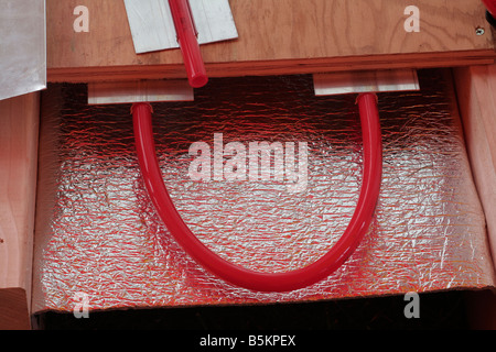Subfloor heating tube system for solar heating panels Stock Photo