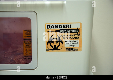 contaminated biohazard receptacle in a medical exam room Stock Photo