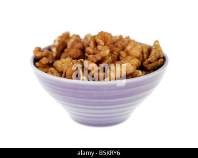 Bowl Of Fresh Healthy Nutritious Walnuts Isolated Against A White Background With No People And A Clipping Path Stock Photo